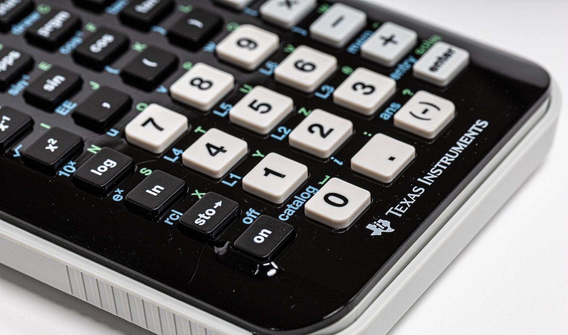 black and white Texas Instruments calculator